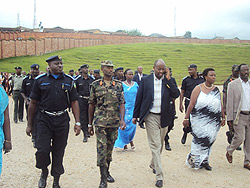 Police Chief, Emmanuel Gasana(L) with Brig. Gen. Mubarak Muganga( C)  and Minister James Musoni at the launch of community policing week in  Muhanga yesterday .(Photo; D. Sabiiti)