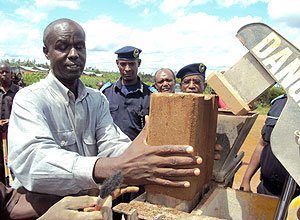 Governor Kabaija officially kicked off the construction project. (Photo: S. Rwembeho)