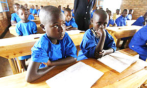 At school. These pupils will sit their PLE examinations in English this year.