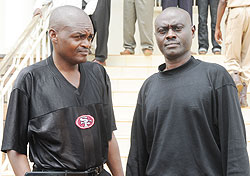 IN THE DOCK: Lt. Colonels Tharcise Nditurende (L) and Noel Habiyambere outside Gasabo court yesterday. (Photo: J. Mbanda)