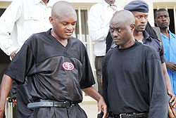 Lt.Colonels Tharcise Nditurende (L) and Noel Habiyambere outside Gasabo court on Thursday (File Photo)