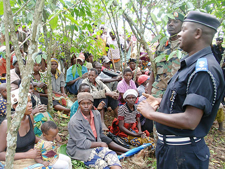 Supt. Rutayisire addressing residents of Kinyinya cell just after the tree planting activity (in the background is Col. Karemera)