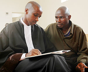 Capt. Jean Marie Vianney Karuta (L) is accused of being a member a terrorist group (Photo; E. Musoni)