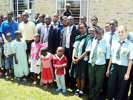 Green Hills Academy entourage poses for a group photo with disabled children in Kamonyi. (Photo / D. Sabiiti)