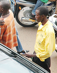 A Parking ticket vendor with KVCS. They claim to have taken six months without pay (File Photo)