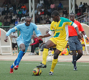 Rayonu2019s Yusuf Ndayishimiye tries to challenge an Atraco defender. The two sides will face off in the MTN Peace Cup semi-final.