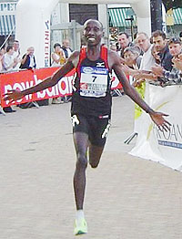 Dieudonne Disi reacts after crossing the finishing line in a previous even in France. (File photo)