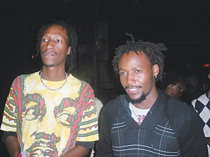 Rwandau2019s famous painters (L-R) Innocent Nkurunziza and Emmanuel Nkuranga seem to be enjoying the show.