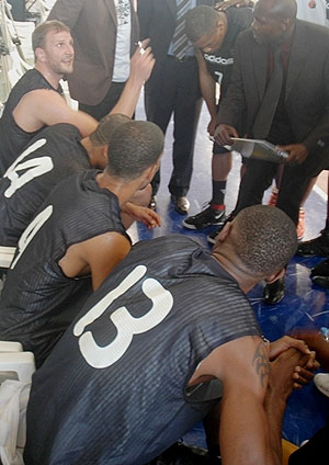 APR coach Cliff Owuor (R) and his players plotting how to overcome Primeiro last year. (File Photo)