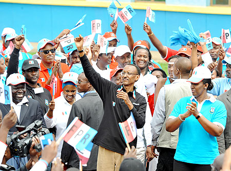 President Kagame celebrates with RPF Party members after being elected the Party's candidate for the 2010 Presidential elections. (Photo Urugwiro Village)