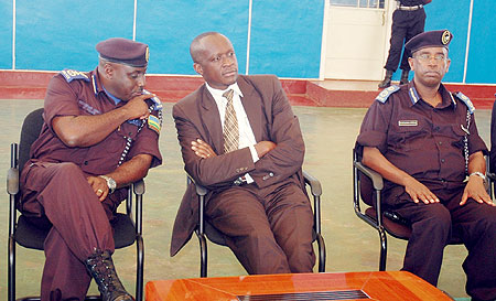 Commissioner and General of Police, Emmanuel Gasana (l), Minister of Sports and Culture, Joseph Habineza and Deputy Commissioner  Genereral, Stanley Nsabimana at the event yesterday. (Photo / F. Goodman)