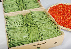 French beans and red pepper: The recent drop in vegetable prices has helped to ease inflation. (File photo)