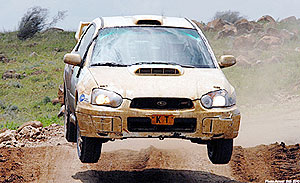 Jamie Whyte powers his machine during the KCB Pearl of Africa Uganda rally.