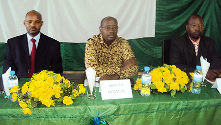 The Minster of Local Government James Musoni (C) Theogen Karake (R) and Cornell Ntakirutinka during the meeting in Rwamagana (Photo; S. Rwembeho)