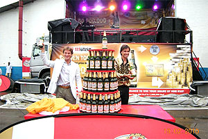 Bralirwau2019s Commercial Director, Alexander Koch unveiling u2018Mu00fctzig Goldu2019 bottles. 