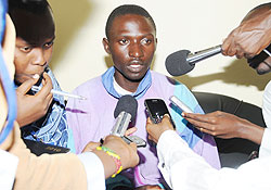 Theophile Uwizeye speaking to Reporters.