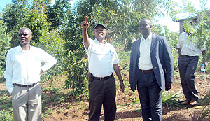 Mayor Protais Murayira (C) taking some visitors around various development projects  in Kirehe district. (Photo: S. Rwembeho)