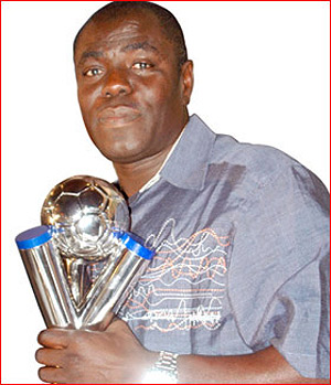 Sellas Tetteh With World Cup Trophy