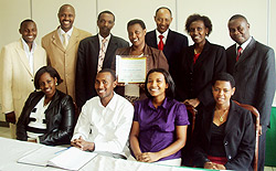 Dr. Balinda Rwigamba (3rd from right) standing, together with the staff and students who participated in the competition  (courtesy photo)