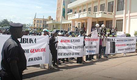  Hundreds of Genocide survivors pitched camp before the Justice ministry to seek legal action against American lawyer, Peter Erlinder, yesterday (Photo F Goodman)