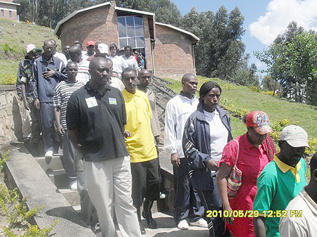 CNLG Exrcutive Secretary Jean de Dieu Mucyo (in yellow T-shirt) alongside other residents in the walk to remember victims of the 1994 genocide against the Tutsi. (Photo: S. Nkurunziza)