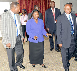 Minister in the Presidentu2019s Office Solina Nyirahabimana (C) speaking to Bishop John Rucyahana (R) and Executive Secretary Jean Baptiste Habyarimana. (Photo J. Mbanda)