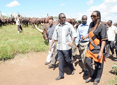 Prime Minister Bernard Makuza with Agriculture Minister Agnes Kalibata during their tour of an RDF Farm in Bugesera District on Monday  (Photo /  J. Mbanda)
