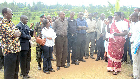 Prime Minister and other government officials listen to cooperative membersu2019grievances. (Photo: S. Rwembeho)