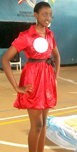One of the beauty contestants dressed a hot red dinner dress.