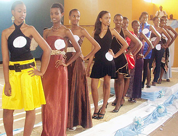 The 11 finalists pose in casual outfits during the beauty pageant.