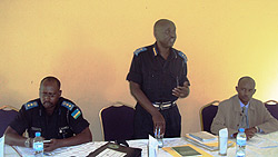 ACP Vianney Nshimiyimana (standing), Gibert Gumira (R) and Jean Marie Muhisemo during the meeting. (Photo/ S. Rwembeho)