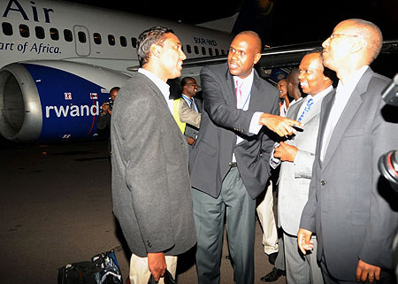 RwandAiru2019s Board Chairman, John Mirenge, introduces the head of the maintenance team to the Ministers of Infrastructure, Vincent Karega, and Finance John Rwangombwa, shortly after the plane arrived yesterday.