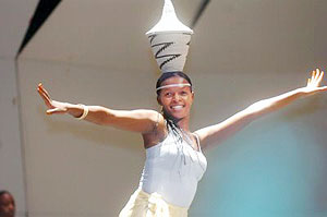 Rwandan woman dancing- Cultrual preservation is directly linked to development.