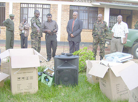 RDF medical services director, Dr. Charles Murego (center) flanked by Brig. Gen Eric Murokore at the hand over ceremony of  the equipment. (Photo: A. Gahene)