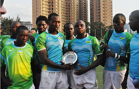 The senior rugby team, Silverbacks, display their silverware from the recent Hong Kong 10s. Tag rugby should result into more silverware in the future.
