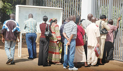 HOPING AND WAITING: Visa applicants queuing up at the Belgian Embassy yesterday morning (Photo; F. Goodman)