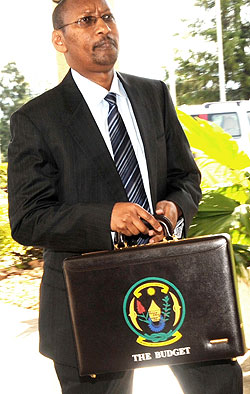 Finance Minister John Rwangombwa arriving at parliament on Thursday (File Photo)