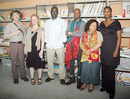 The visiting delegation poses for a photo, far right is Carole Karemera. (Photo: F. Goodman)