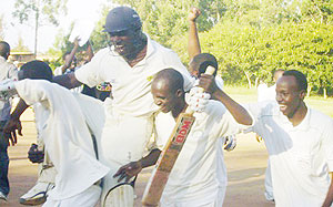 Dusingizimana is lifted by his teammates after guiding KCT into the last four of the Computer Point T20. (File Photo)