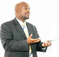 OLPC coordinator, Nkubito Bakuramutsa, addressing school heads yesterday (Photo; F. Goodman)