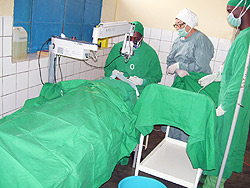 Army medical personnel carry out an eye operation on a patient at Byumba hospital (Photo; A. Gahene)