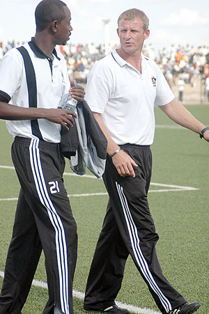 The late Jean Claude Ishimwe (L) with APR coach Paske. (File photo)