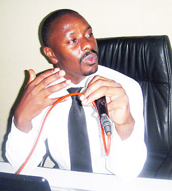 Peter Ntigurirwa explaining how his company works with gospel artists (Photo Eugene Mutara)