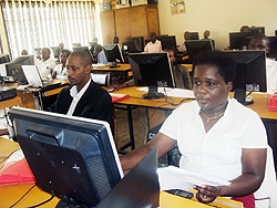 9YBE Head teachers attending computer training. Photo S. Rwembeho.