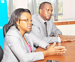 Partner Bernice Kimacia of PriceWaterhouse Coopers, flanked by ICPARu2019s Peter Rutaremara (Courtsey Photo)