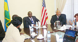 Dr.Richard Sezibera (R) with Ambassador Eric Gossby during the signing of the agreement. (Courtesy photo)