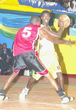 Former Marines captain Fiston Muhire (with the ball) now plays his trade with KBC. (File photo)