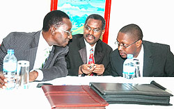 This method is better; Prof. Geoffrey Rugege engaging Dr. Andrew Muhirwa and  Dr.Alfred Nuwagaba during the workshop yesterday (Photo. F. Goodman)