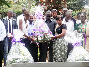 Rwandan Students in India laying a wreath at Kigali Genocide Memorail Center(Photo Eugene Mutara)