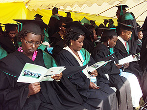 Graduates checking out their names during the graduation (Photo; B. Mukombozi)